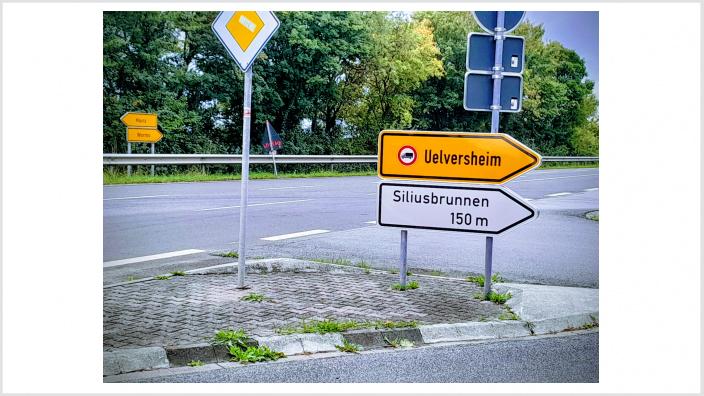 Hinweisschild zum Siliusbrunnen Hinweisschild